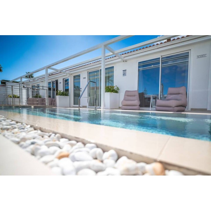 HL Miraflor Suites Hotel